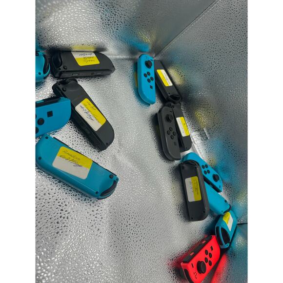 nintendo switch right joycons as pictured for parts or repair